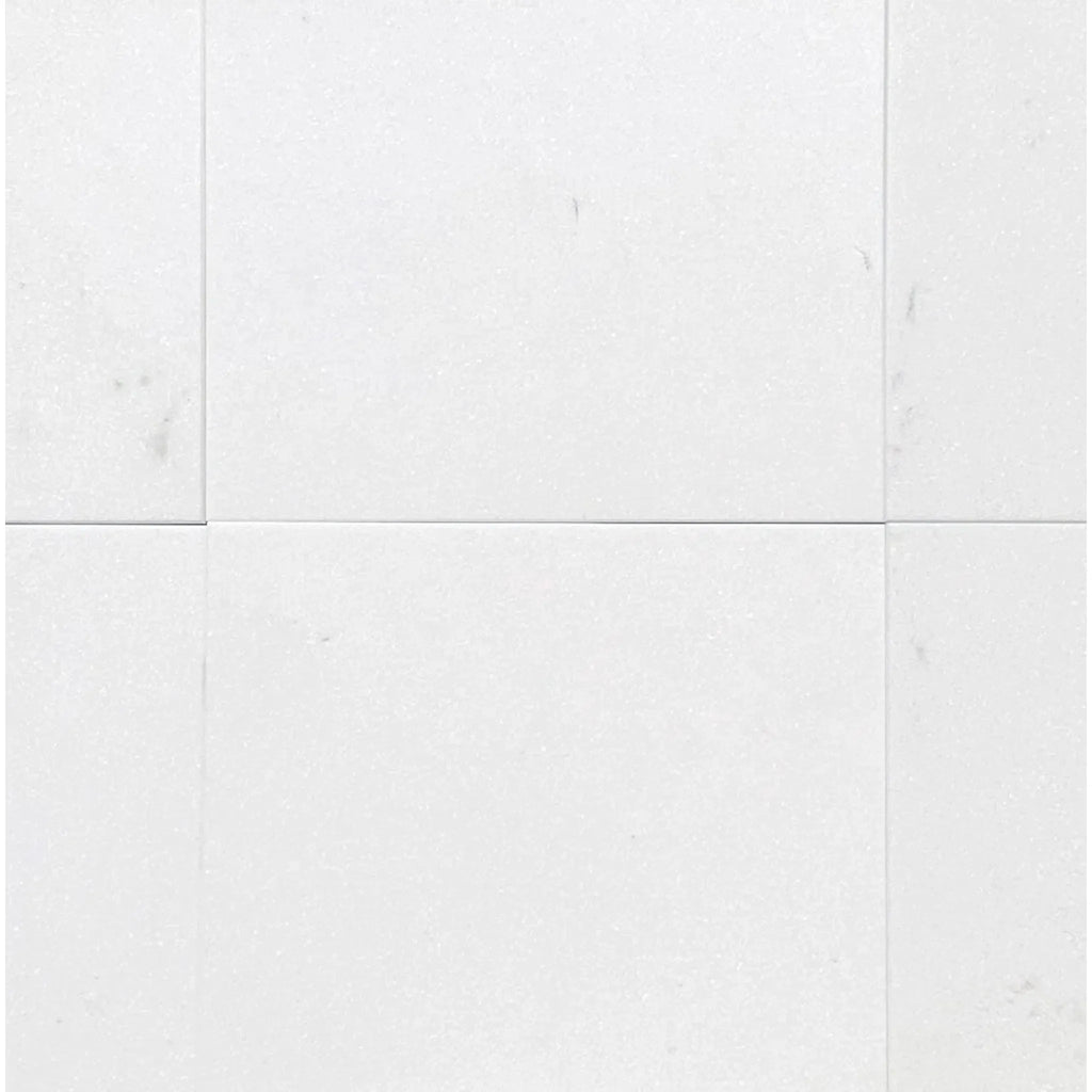 Thassos White Marble honed tile on a pristine white tiled surface for elegant flooring