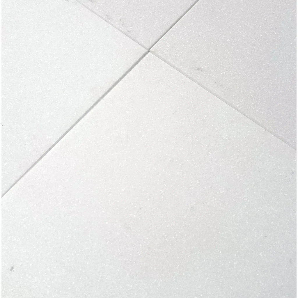 White tiled floor featuring Thassos White Marble 12X12 Honed Tile for elegant interiors