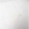 White tiled surface of Thassos White Marble 12X12 Honed Tile for elegant interiors