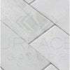 White rectangular tile pattern of Thassos White Marble 3X6 polished tile on display