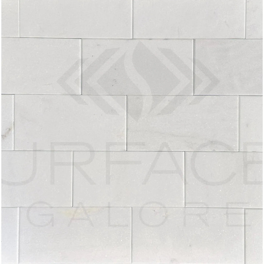 Thassos White Marble 3X6 Polished Tile displayed on a white rectangular tile wall
