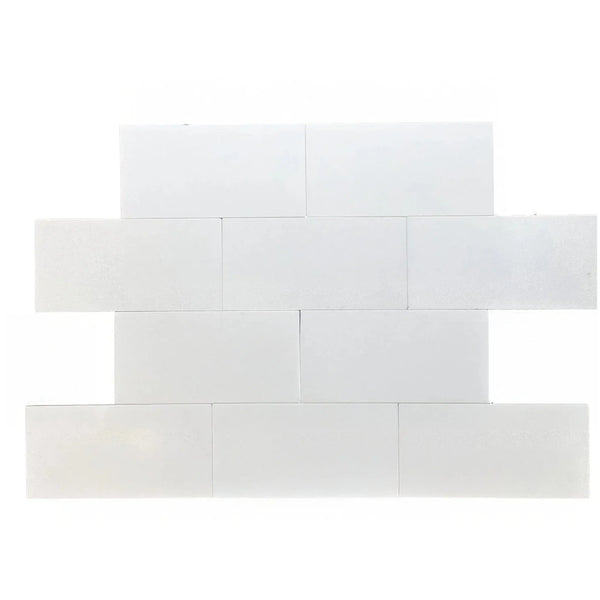 White rectangular brick pattern of Thassos White Marble 6X12 Polished Tile