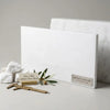White rectangular thassos white marble slab with subtle veining polished or honed by surfaces galore