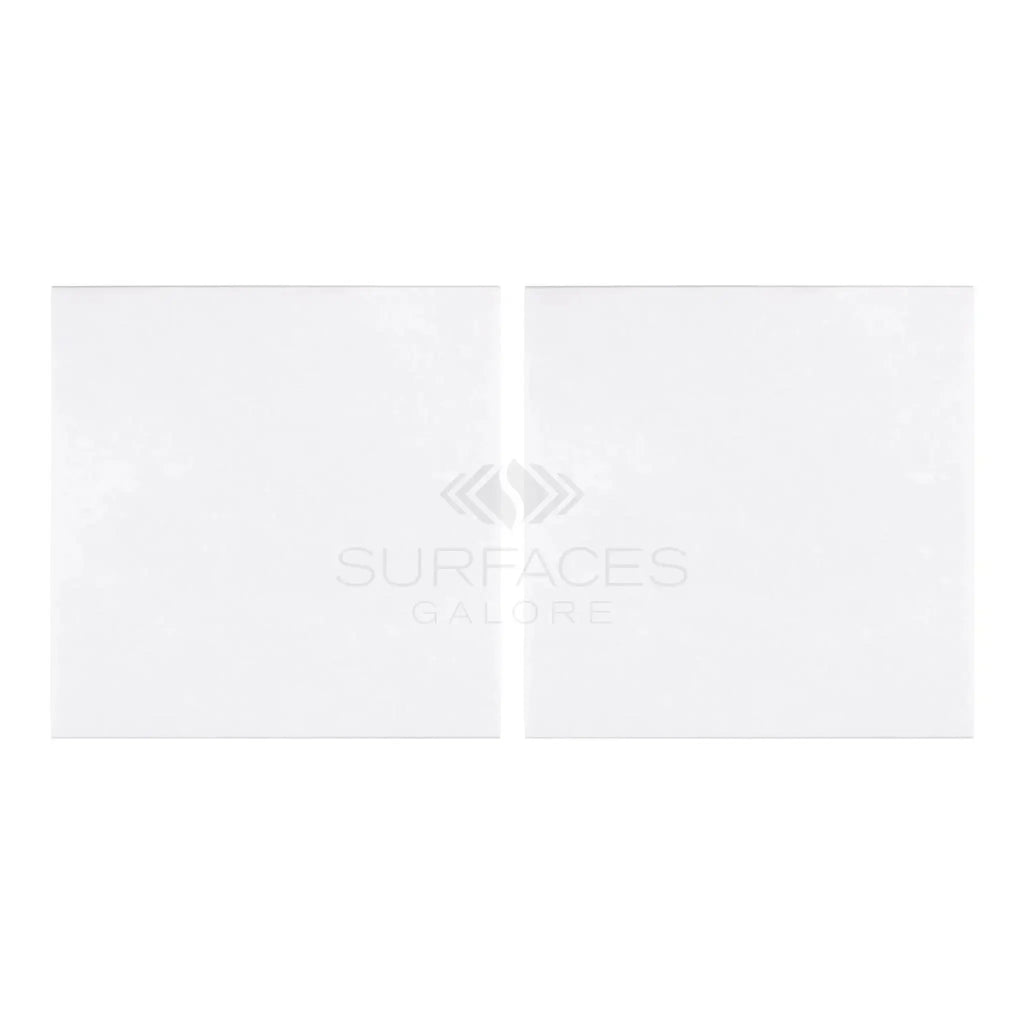 Two white square panels of Thassos White 18X18 Marble Polished or Honed