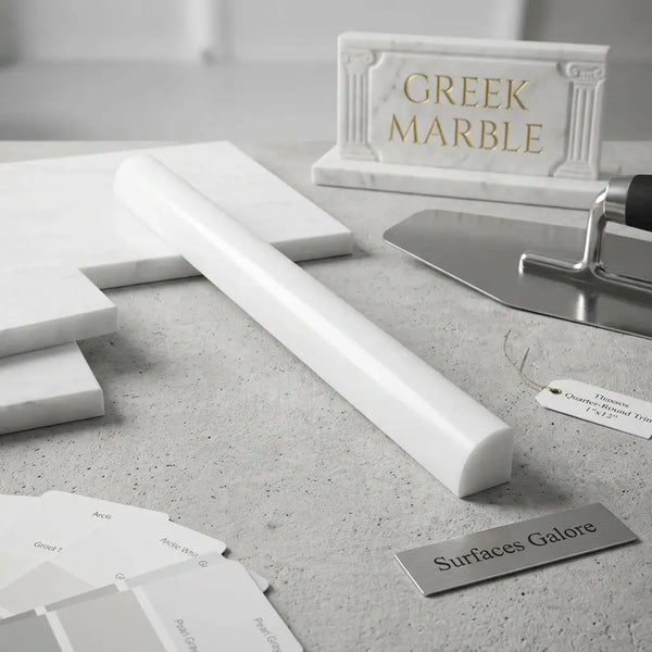 A sleek white marble quarter-round trim with polished finish and subtle veining for upscale interior detailing