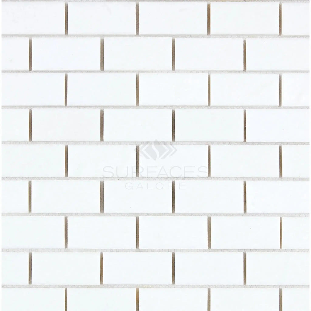 Thassos White 1X2 Brick Mosaic Marble Polished or Honed in a white subway tile pattern