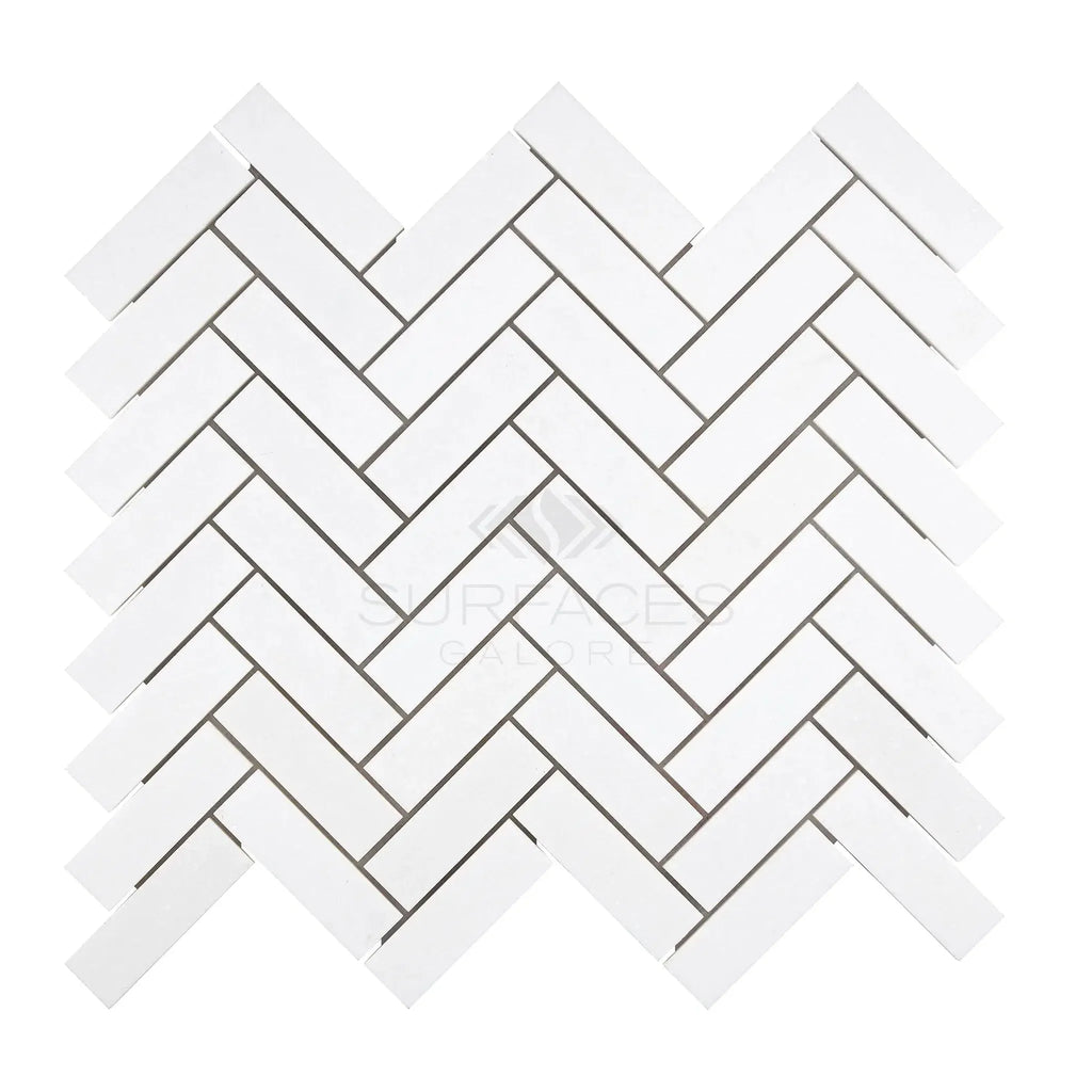 Thassos White 1X3 Herringbone Mosaic Marble Polished or Honed with a white tile pattern