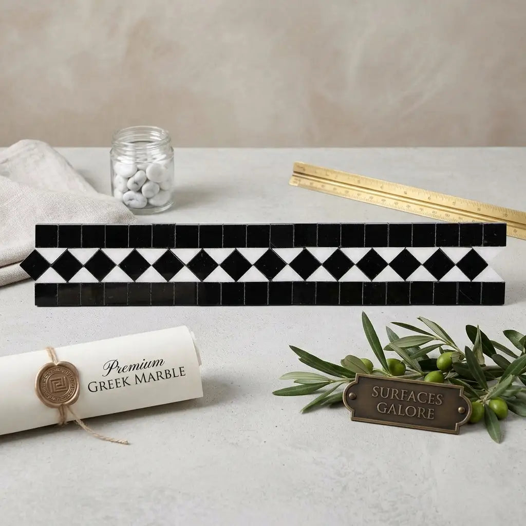 Black and white marble tile border with geometric diamond pattern thassos white 2x12 bias border with black polished or honed