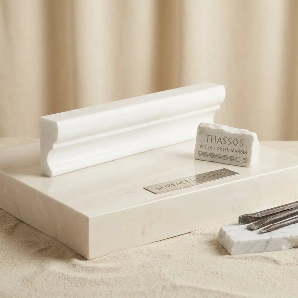 Thassos white 2x12 crown molding in polished white Greek marble with a smooth classic architectural profile