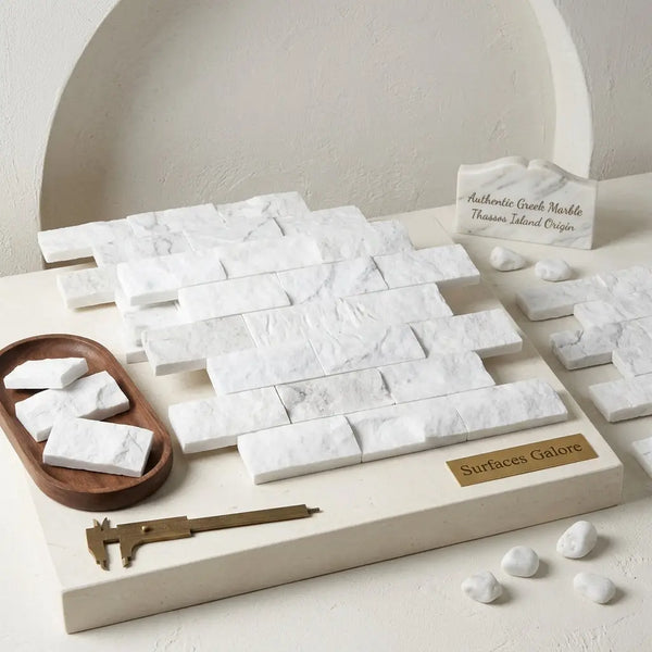 Thassos white 2x4 brick mosaic marble split-faced tiles in white Greek marble with subtle gray veining on display board