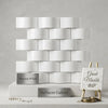Thassos white 2x4 round-faced mosaic marble tiles in polished finish arranged in staggered brick pattern
