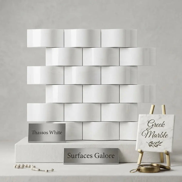 Thassos white 2x4 round-faced mosaic marble tiles in polished finish arranged in staggered brick pattern