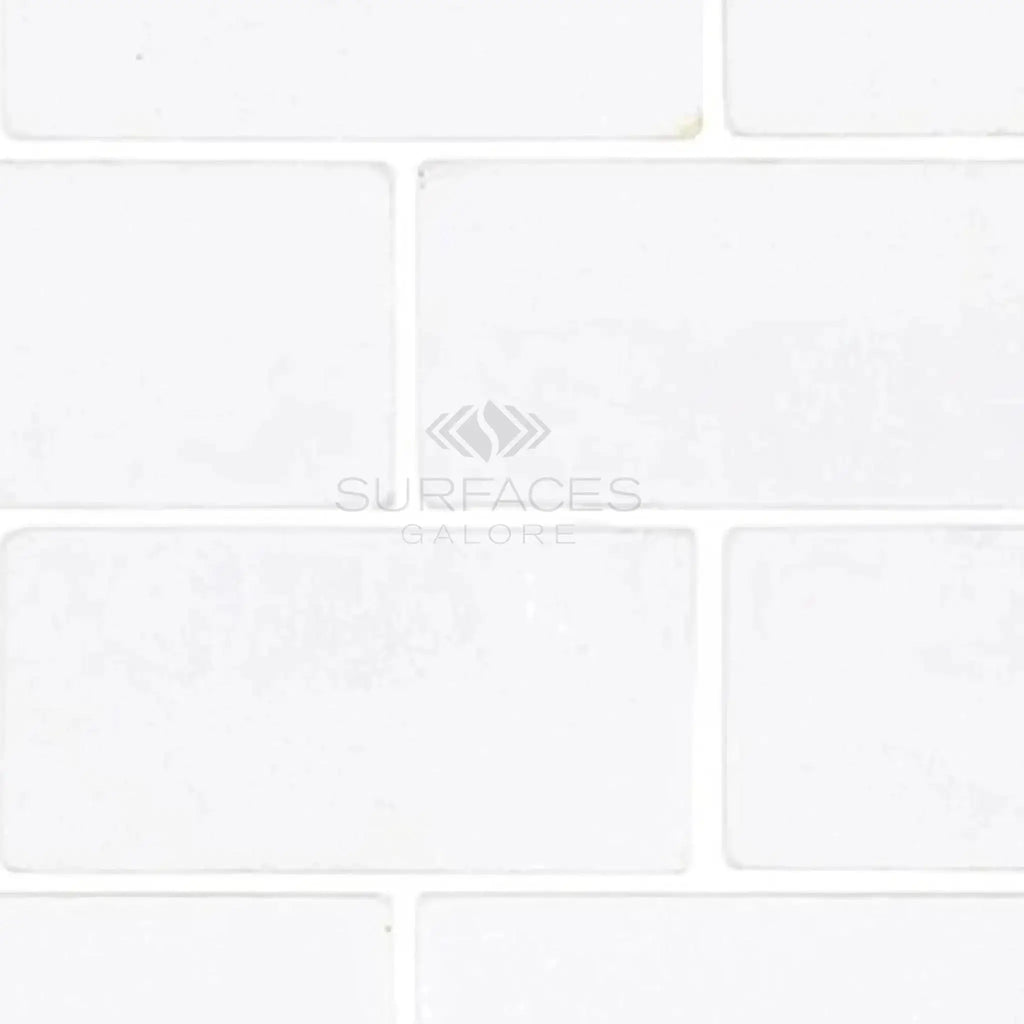 Thassos White 3X6 Marble Tumbled featuring a sleek white rectangular tile pattern