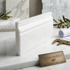 Thassos white baseboard trim made of polished white greek marble with a smooth surface and classic profile