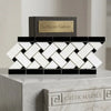Black and white herringbone mosaic tile with dark wood base and gold plaque thassos white marble polished basketweave border