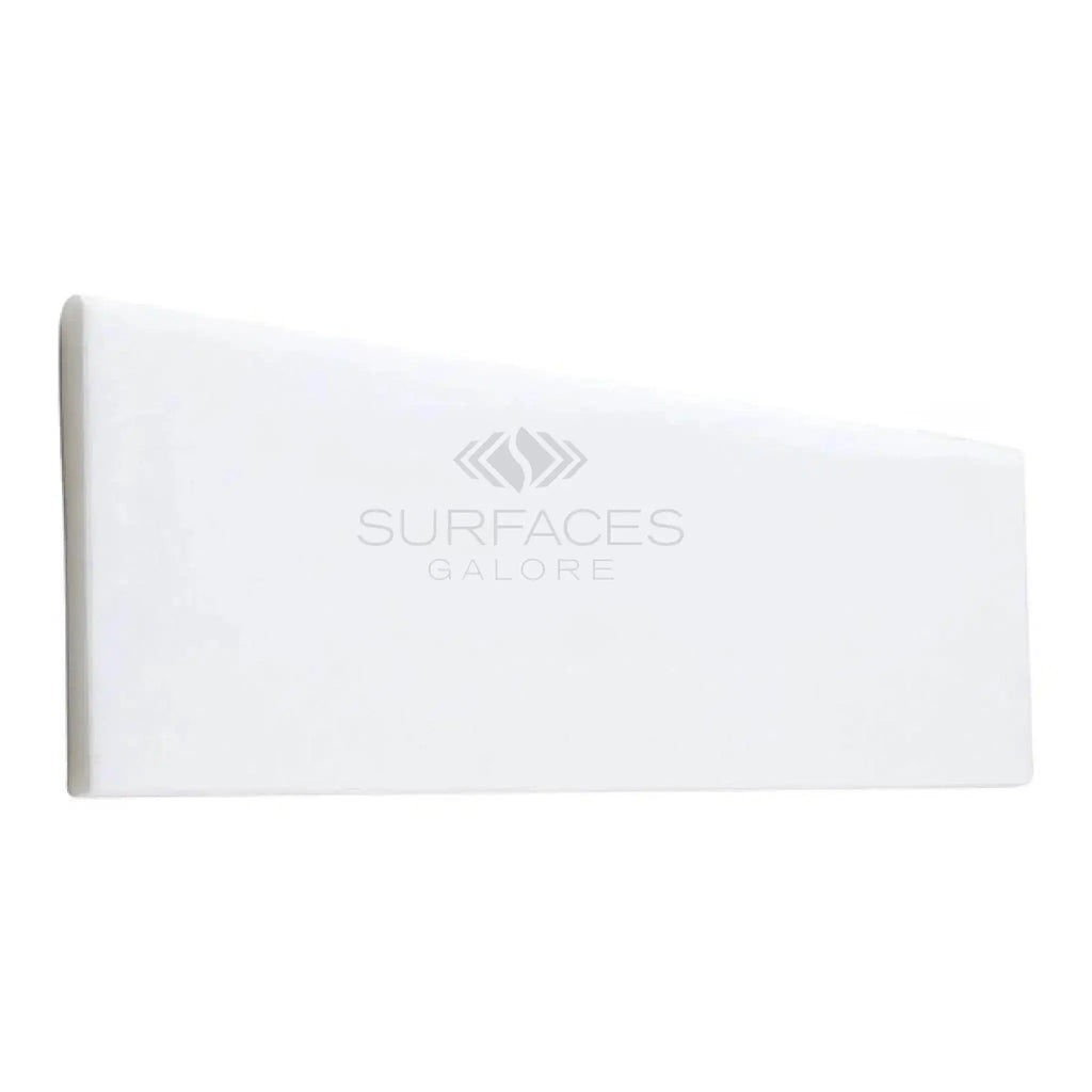 White rectangular pillow on Thassos White 4X12 marble polished or honed surface