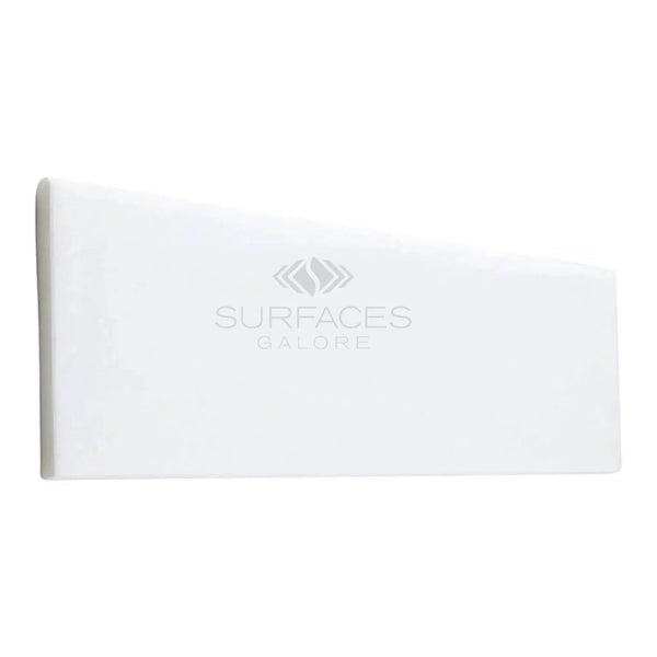White rectangular pillow on Thassos White 4X12 marble polished or honed surface
