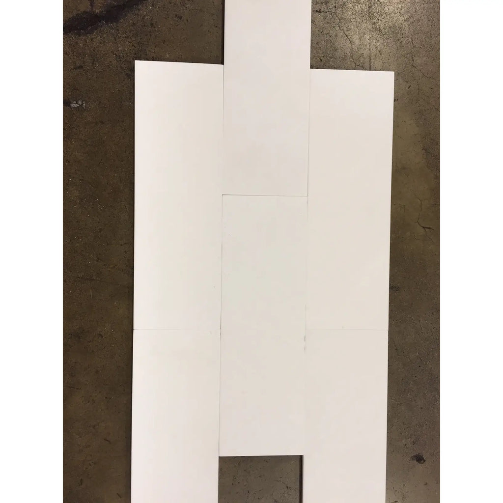 Arrangement of white paper strips for Thassos White 4X12 Marble polished or honed