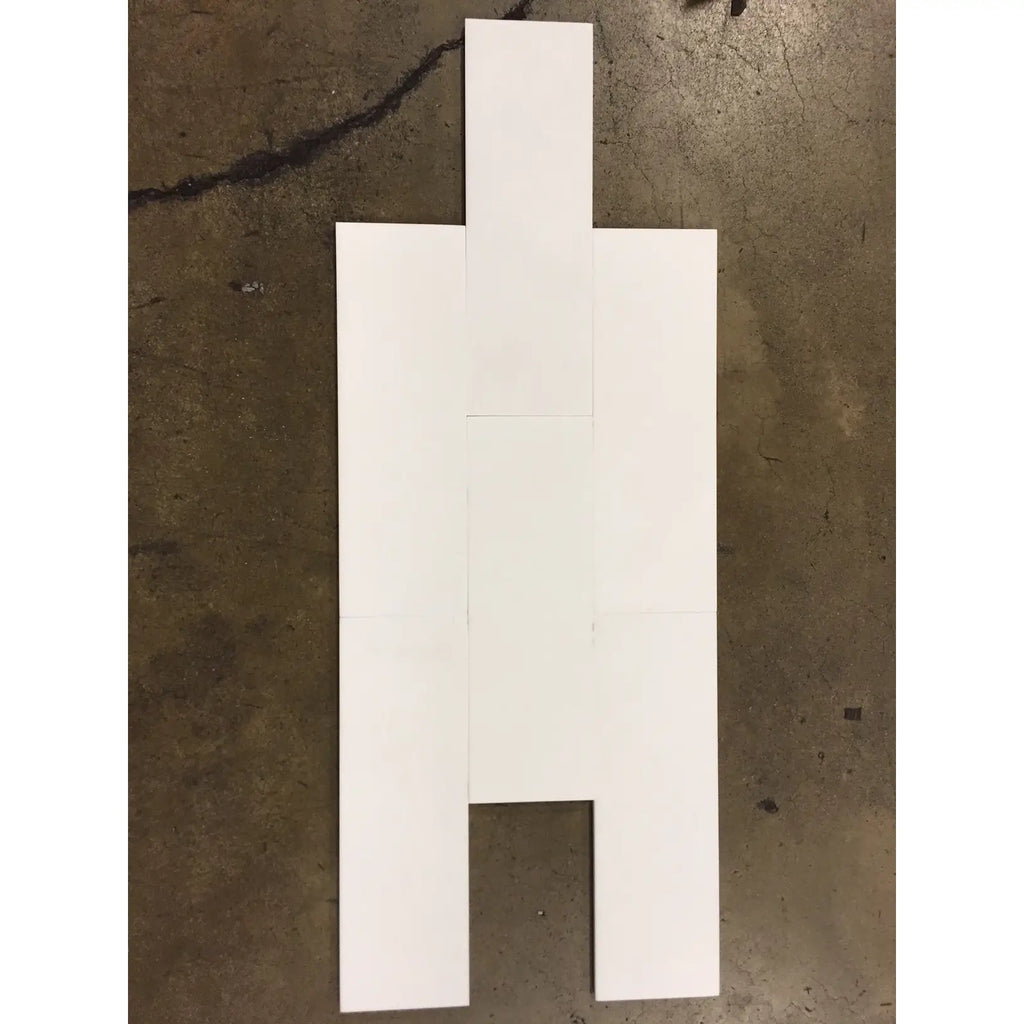 White cardboard cutout of a person for Thassos White 4X12 Marble polished or honed