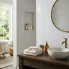 White herringbone patterned thassos white marble polished mosaic tile wall in 5/8x1 1/4 mini herringbone design