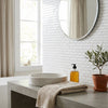 White ceramic vessel sink paired with thassos white 5/8x1 1/4 mini-brick mosaic marble polished or honed tiles