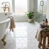 Thassos White 5 inch hexagon mosaic marble floor tiles in polished or honed finish with subtle gray veining