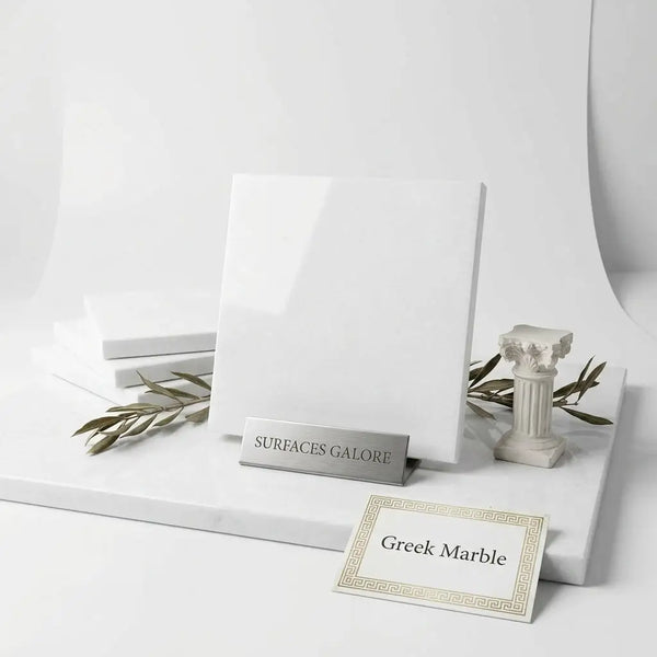A sleek polished Thassos White 6x6 marble tile sample with glossy white Greek marble and subtle veining