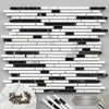 Black and white polished marble mosaic tile with modern linear design featuring thassos white bamboo sticks pattern
