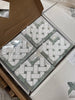 Boxes of decorative mosaic tiles with basketweave pattern for Thassos White Border Marble