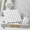 Thassos white basketweave mosaic marble tile with blue-gray woven pattern in polished or honed finish displayed on pedestal