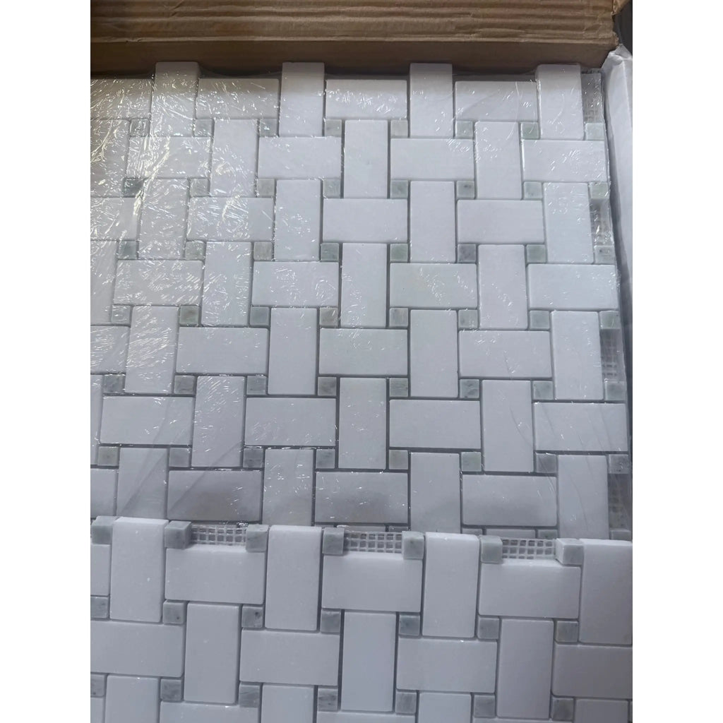 White rectangular mosaic tiles with small gray square accents from Thassos White Basketweave Mosaic