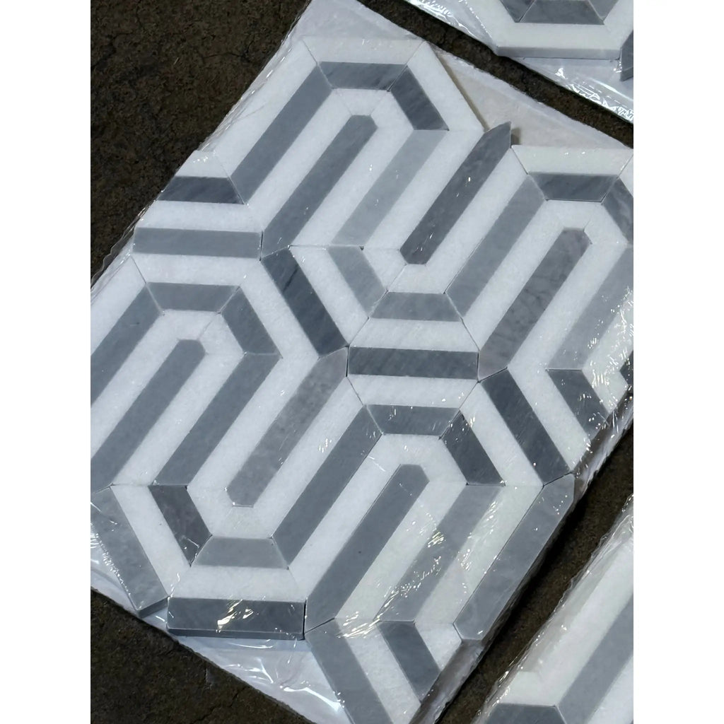 Geometric gray and white tile pattern on Thassos White Berlinetta Design Mosaic