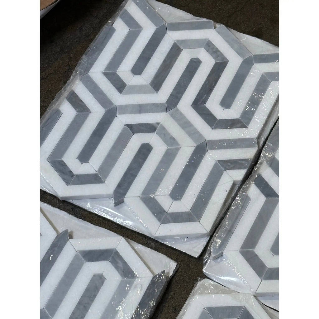 Geometric patterned marble tiles from Thassos White Berlinetta Design with Blue-Gray accents