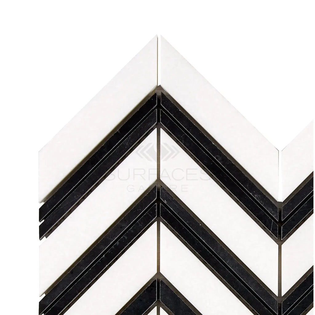 Black and white chevron tile pattern in Thassos White Large Chevron Mosaic Marble