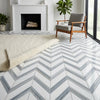 Gray and white chevron-patterned Thassos white large mosaic marble floor tiles polished or honed with blue-gray accents