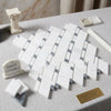 White greek marble mosaic tiles with silver gray accents in a diagonal lattice pattern thassos white blue gray polished or honed