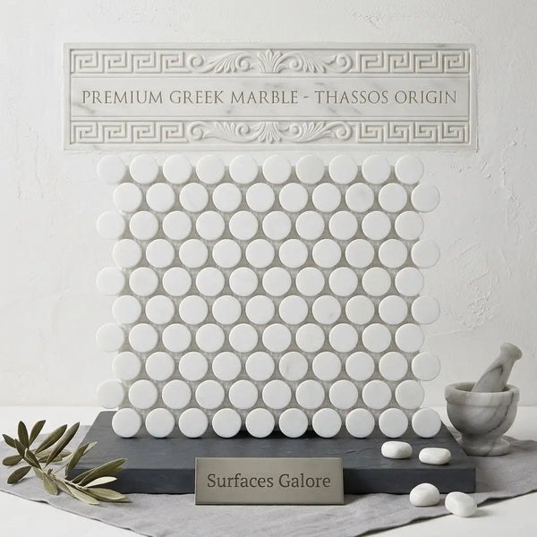 White circular greek marble mosaic tiles in a grid pattern thassos white penny-round polished marble