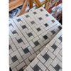 Thassos white pinwheel mosaic marble tile with blue-gray woven pattern in polished or honed finish wrapped in clear plastic