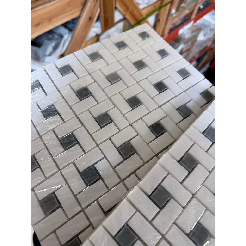 Thassos white pinwheel mosaic marble tile with blue-gray woven pattern in polished or honed finish wrapped in clear plastic
