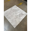 Light gray Tundra Gray 12x24 marble tile with intricate white and darker gray veining