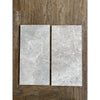 Two Tundra Gray 12X24 Marble Polished or Honed tiles with a gray marble pattern