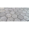 Tundra gray 2 inch hexagon marble mosaic tiles with subtle stone texture and dark grout lines polished or honed finish