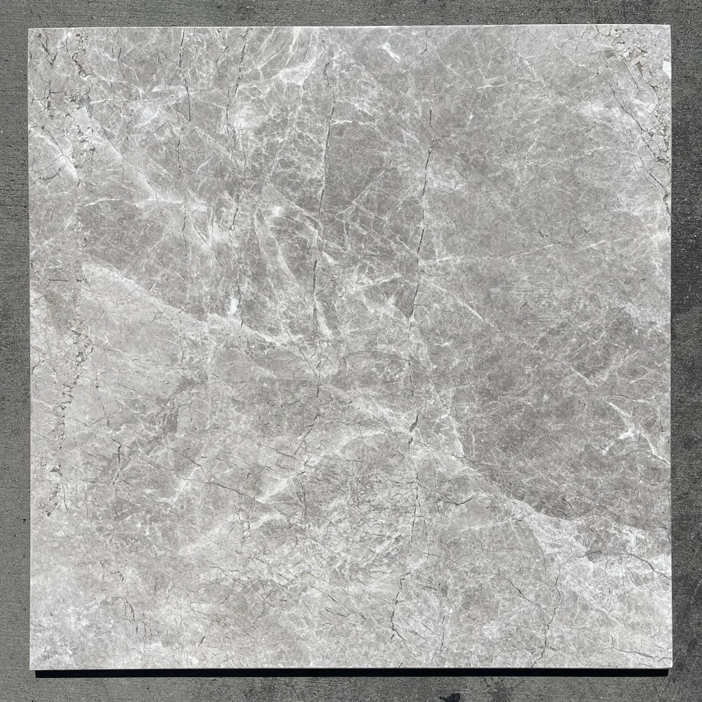 Square gray marble tile from Tundra Gray 5/8X2 Brick Marble Mosaic Split-Faced