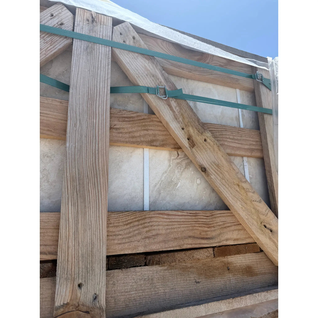 Wooden crate with green straps for Valencia Travertine 18x18 Filled and Honed tile