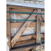 Wooden-framed stone slab from Valencia Travertine 18X18 Filled and Honed collection