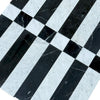 Black and white marble tile pattern of Veneto in Nero Marquina and Carrara White