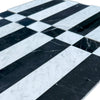 Black and white marble tile pattern of Veneto in Nero Marquina and Carrara White