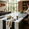 Black and white marble kitchen island Veneto in Nero Marquina and Carrara White with bold striped pattern