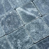 Blue-gray square stone tiles from Verde Alpi Green Marble Tumbled collection