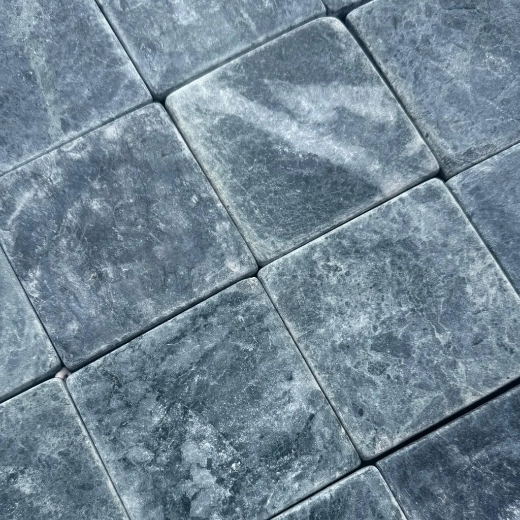 Blue-gray square stone tiles from Verde Alpi Green Marble Tumbled product collection